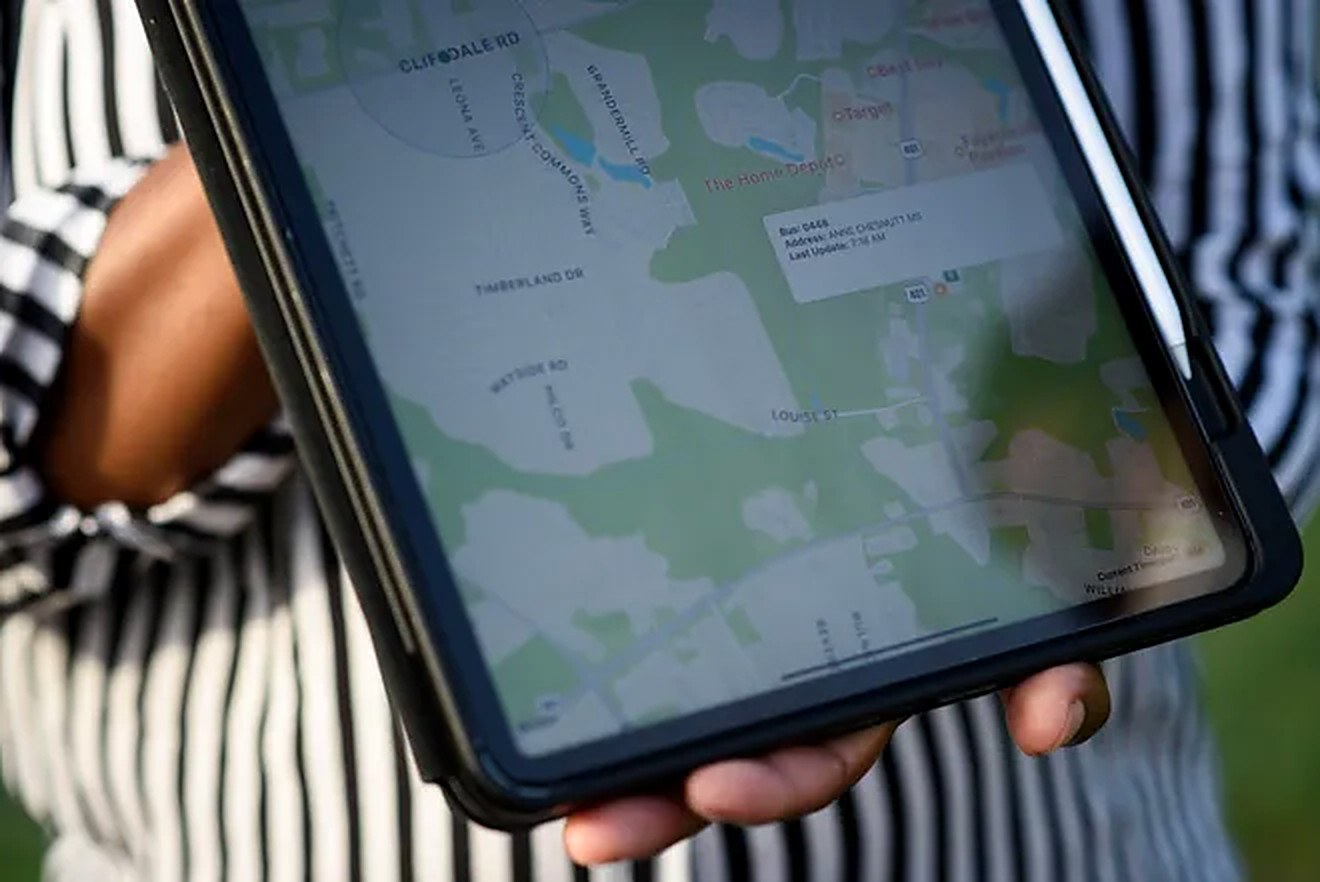 A parent watching their child's bus on a live map in Here Comes the Bus